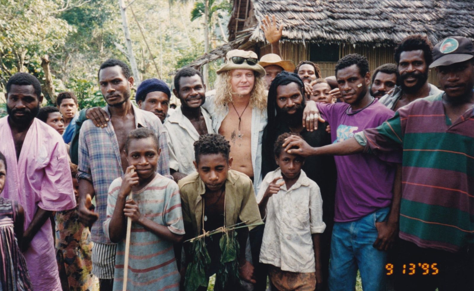Jonathan Little with a group of people, photographed in 1995